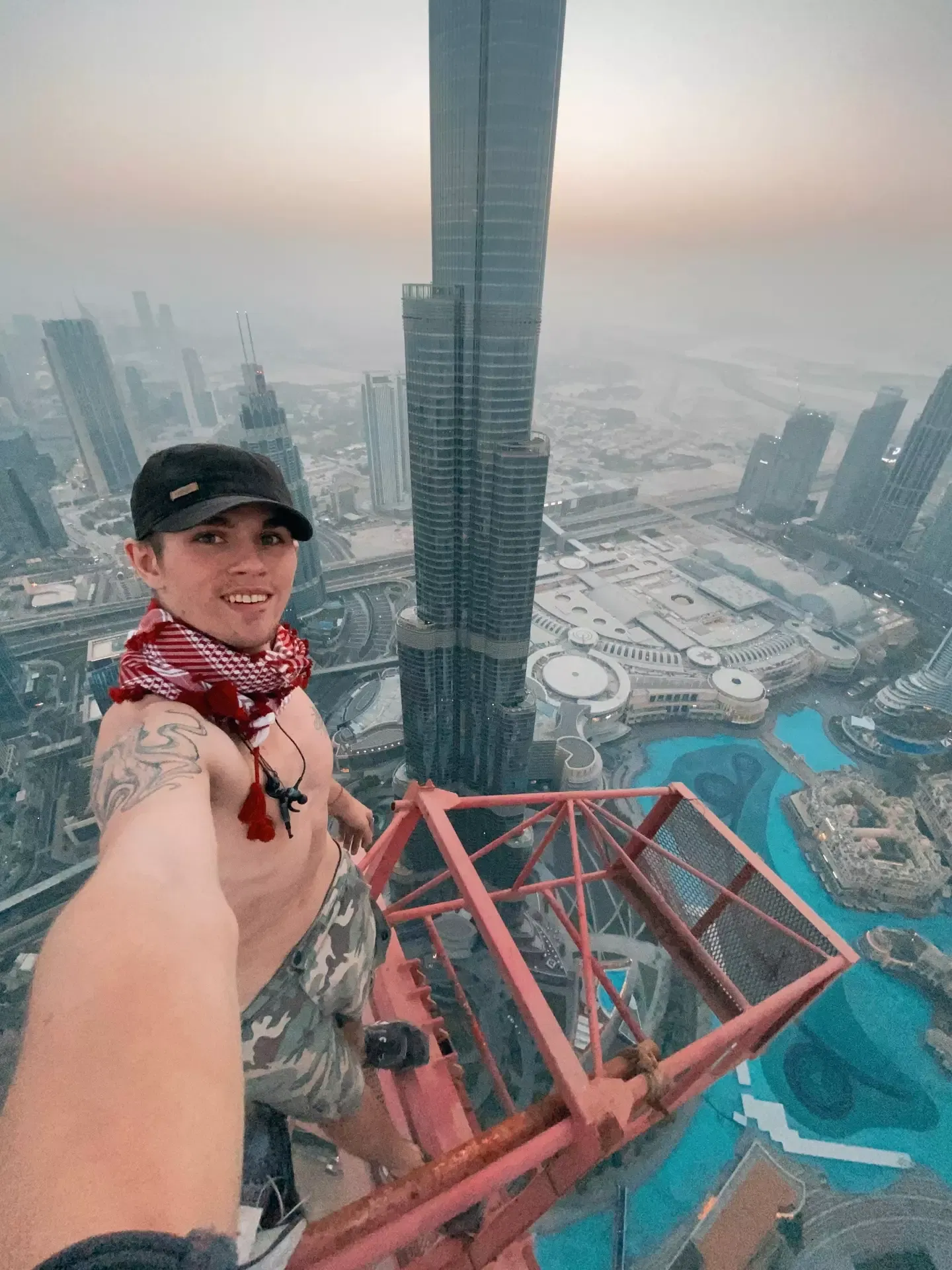 Shockinging and Brave: Daredevil Climber Adam Lockwood Scales 1,200ft Above Dubai in a Risky Situation